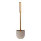 A concrete toilet brush holder with toilet brush on white background.