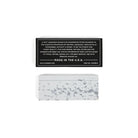 Ironquill sharpening stone on white background next to box with text