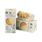 Two boxes of Island Bakery Lemon Melts, with one box open and a sleeve of cookies.