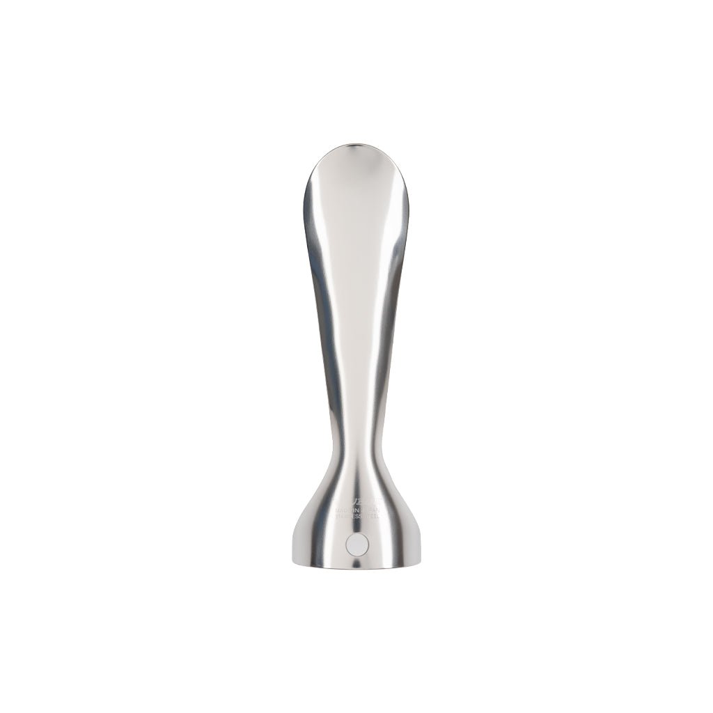 Stainless steel Japanese food grater standing on white background