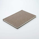 Brown notebook on a white background