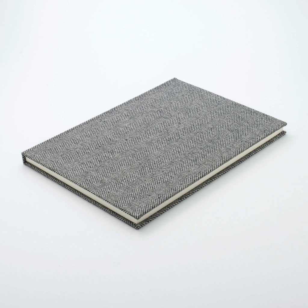 Gray textured notebook on a white background