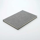 Gray textured notebook on a white background