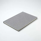 Textured gray A5 notebook on a white background
