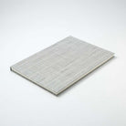 Gray striped notebook on white background