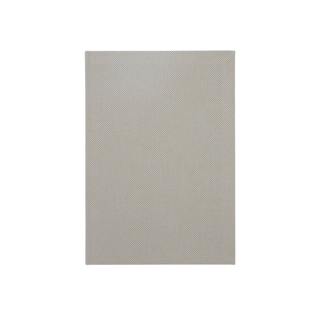 A notebook with a woven cover on white background.