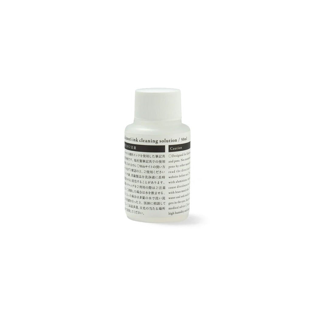 Bottle of ink cleaning solution.