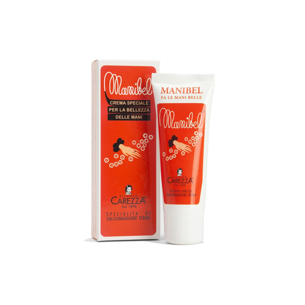 A tube and box of Pilogen Carezza Manibel hand cream, featuring a vibrant red-orange label on a white tube and box, set against a plain white background.