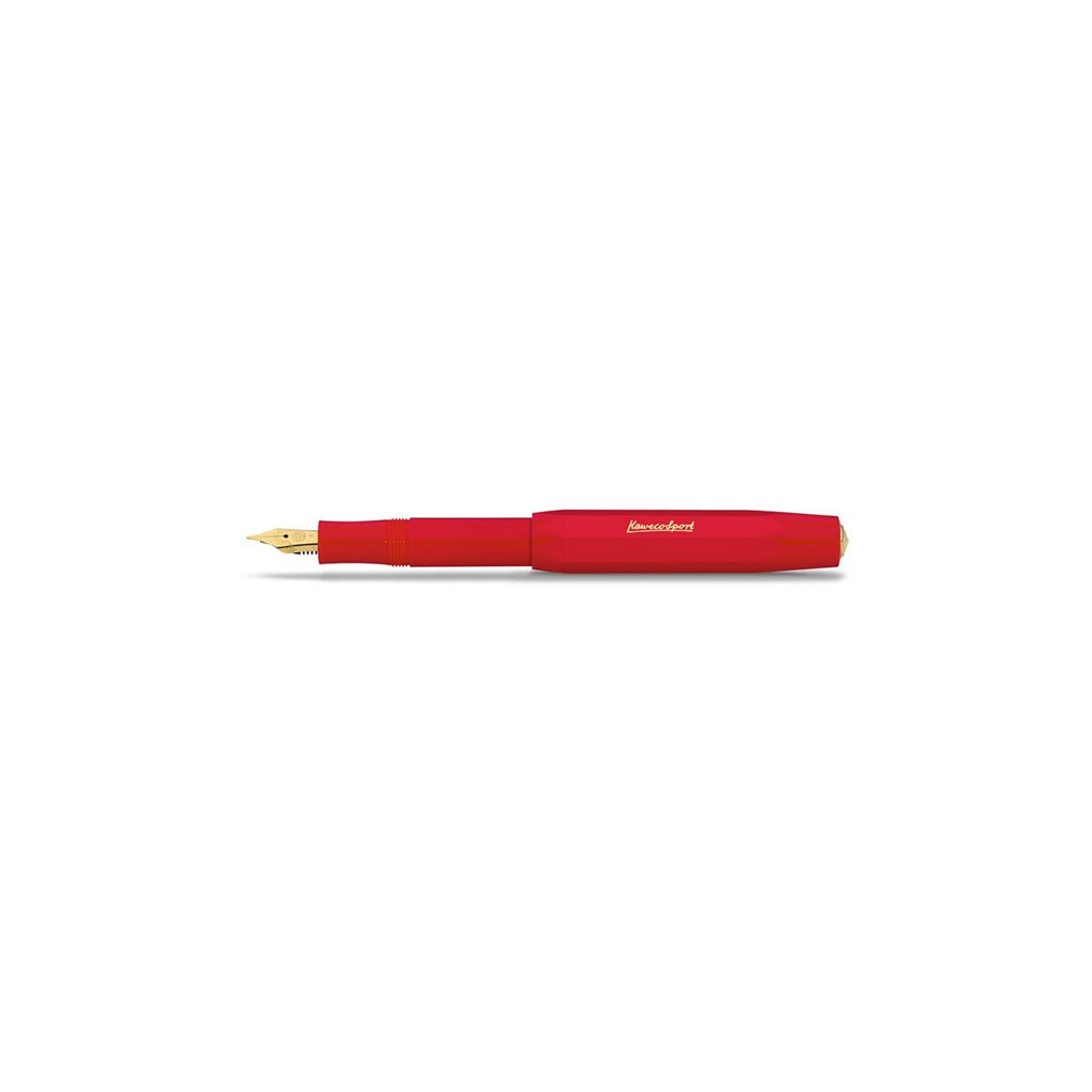 Red fountain pen with gold nib on a white background