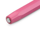 Close-up of back of Kaweco pink pen with silver accents on white background
