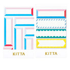 Set of pre-cut washi stickers with colorful frame designs in paper holder on white background