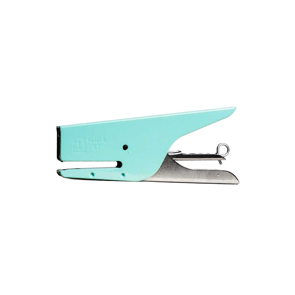 Mint blue green and silver handheld stapler on a white background
