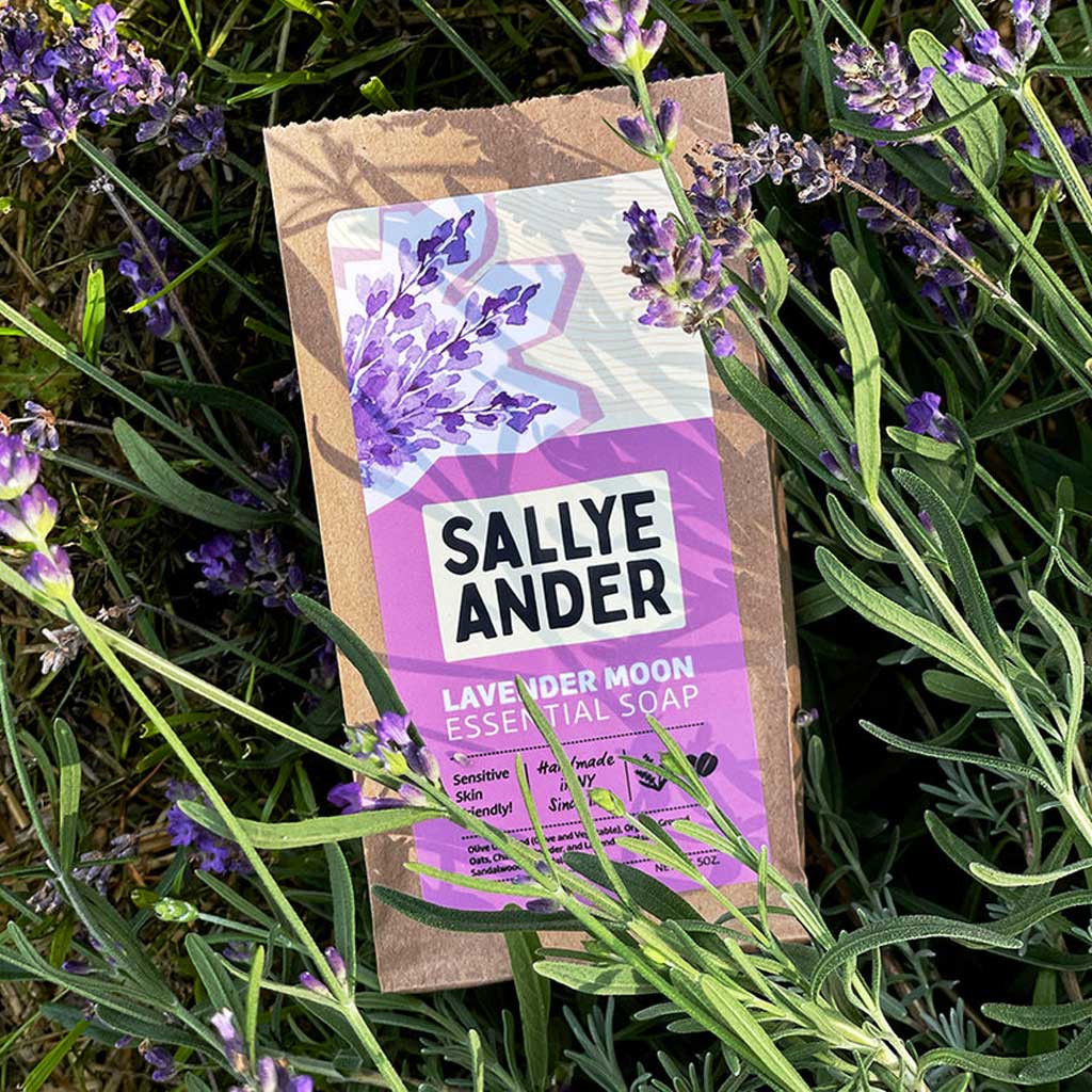 Sallye Ander lavender moon essential soap packaging among lavender flowers