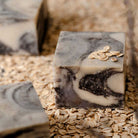 SallyeAnder lavender moon Marble-patterned soap bar with oats on a bed of oats