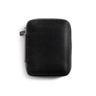 Black leather zippered pen pouch on a white background