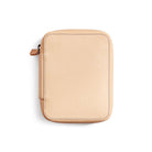 Natural undyed leather zippered pen pouch on a white background