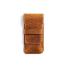 Brown leather pen case on white background