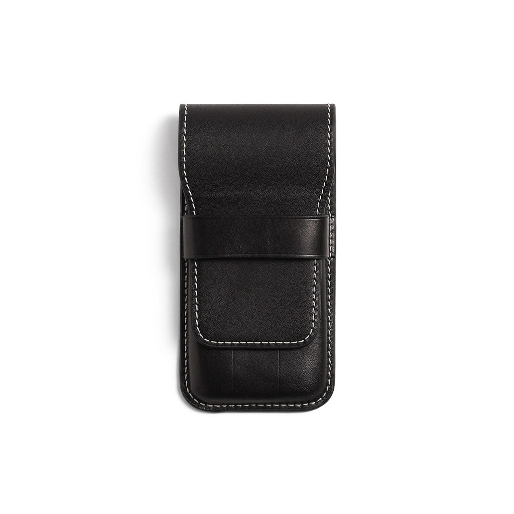 Black leather pen case on white background