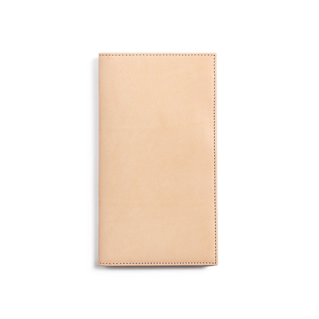 Natural undyed leather Traveler's Notebook wallet insert on white background