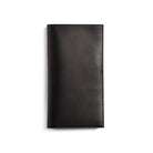 Black leather Traveler's Notebook wallet insert on white background