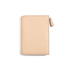 Natural undyed leather zippered wallet insert on white background