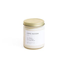 Candle jar labeled 'Love Potion' on a white background