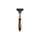 Chrome razor with imitation horn handle and D.R. Harris branding on white background