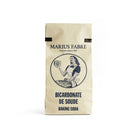 A vintage-style paper bag of Marius Fabre Baking Soda (Bicarbonate de Soude) on a clean white background. 