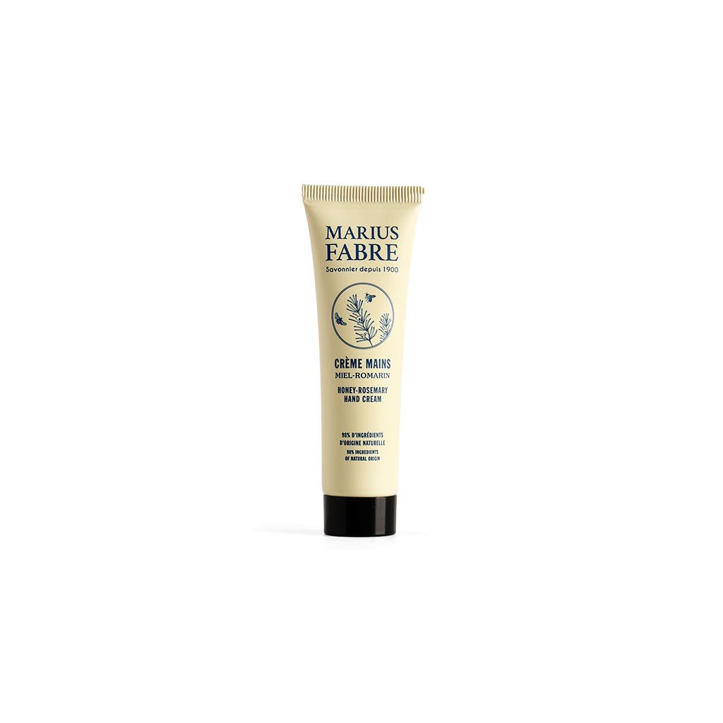 Cream colored tube of Marius Fabre honey and rosemary hand cream lotion.