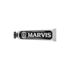 Black Amarelli Licorice marvis toothpaste tube on white background