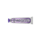 Purple Jasmin mint marvis toothpaste tube on white background