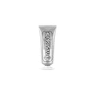 Travel-size tube of Whitening Mint Marvis toothpaste.