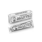 A tube and box of Marvis Whitening Mint toothpaste on a clean white background.