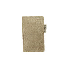 Scouring side of mater kitchen sponge on white background