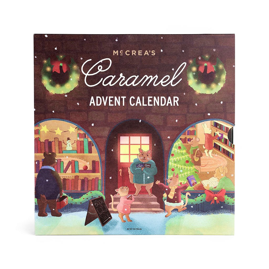 McCrea's Caramel Advent Calendar featuring a cozy holiday-decorated bookshop exterior.