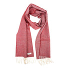 A textured red woven scarf with white fringe.