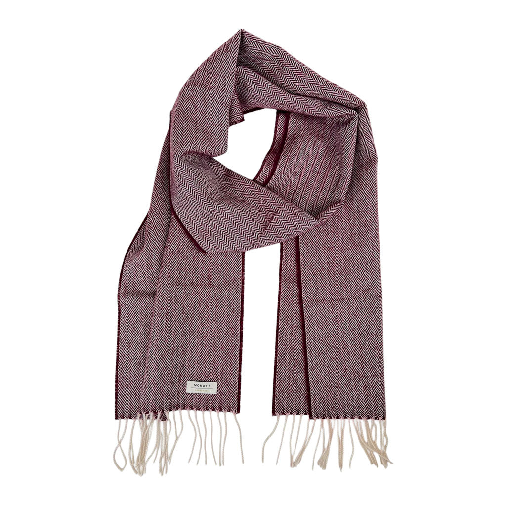 Mulberry lambswool scarf arranged in a loop on a white background.