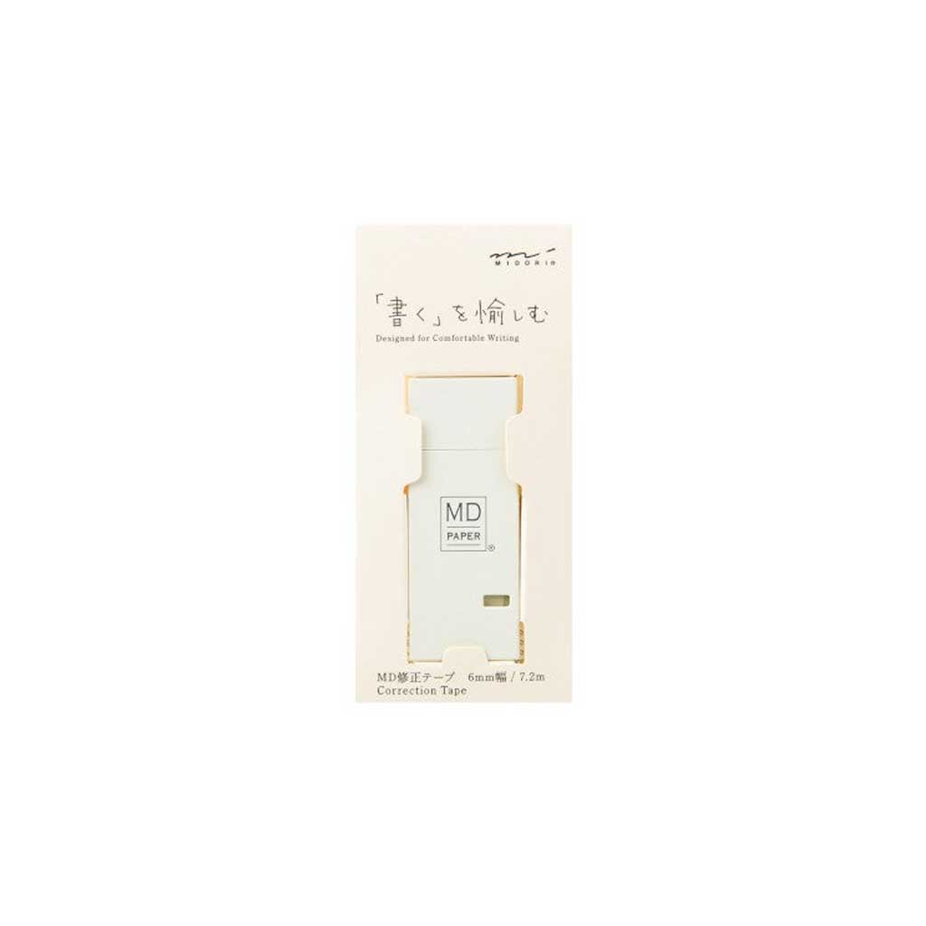 Packaging of MD paper correction tape with Japanese text on a white background