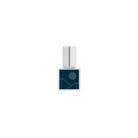 Perfume bottle with blue geometric design on a white background