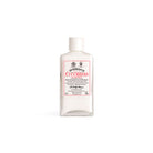 Bottle of D. R. Harris milk of cucumber and roses with white cap on white background
