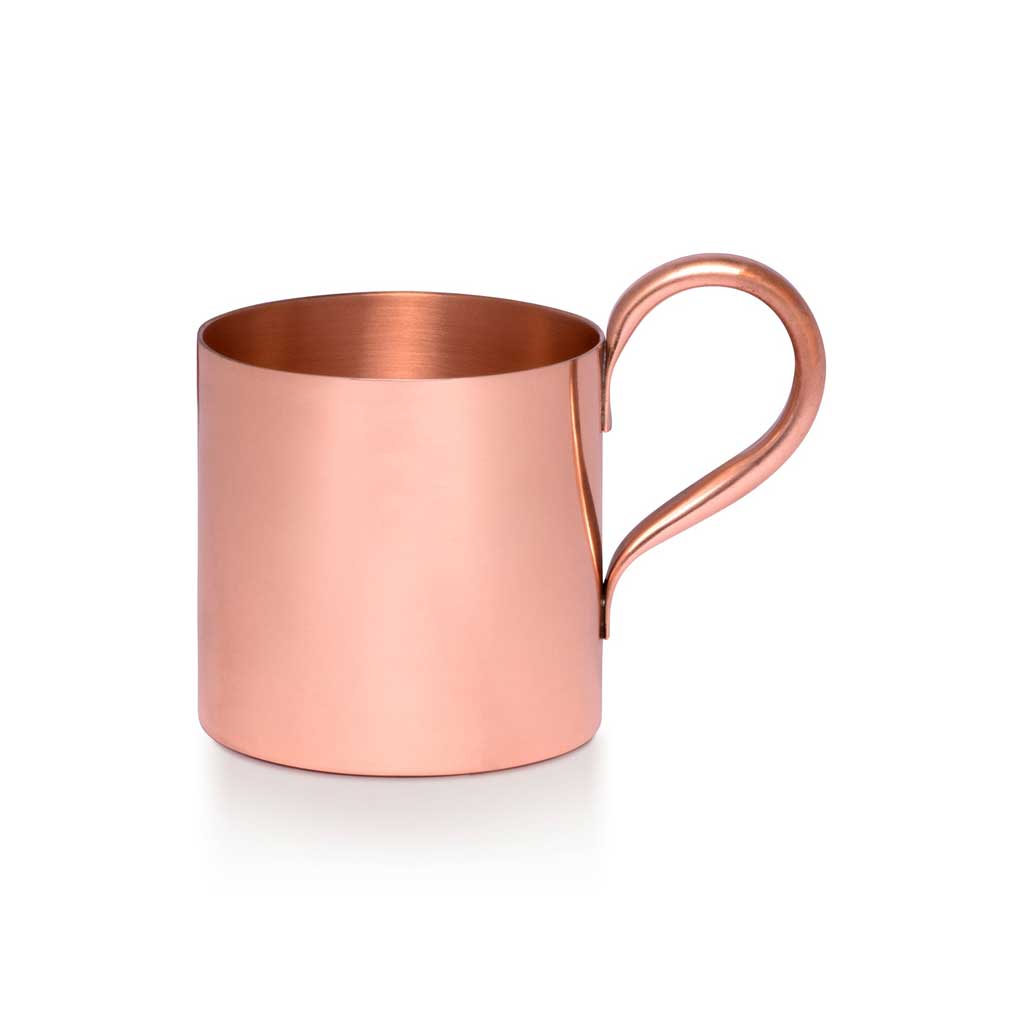 Copper mug with handle on a white background