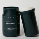 No Tox Life Earl Grey Deodorant tube empty next to grey refill capsule.