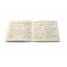 Inside view of housecleaning booklet with detailed instructions for floors, walls, and upholstery