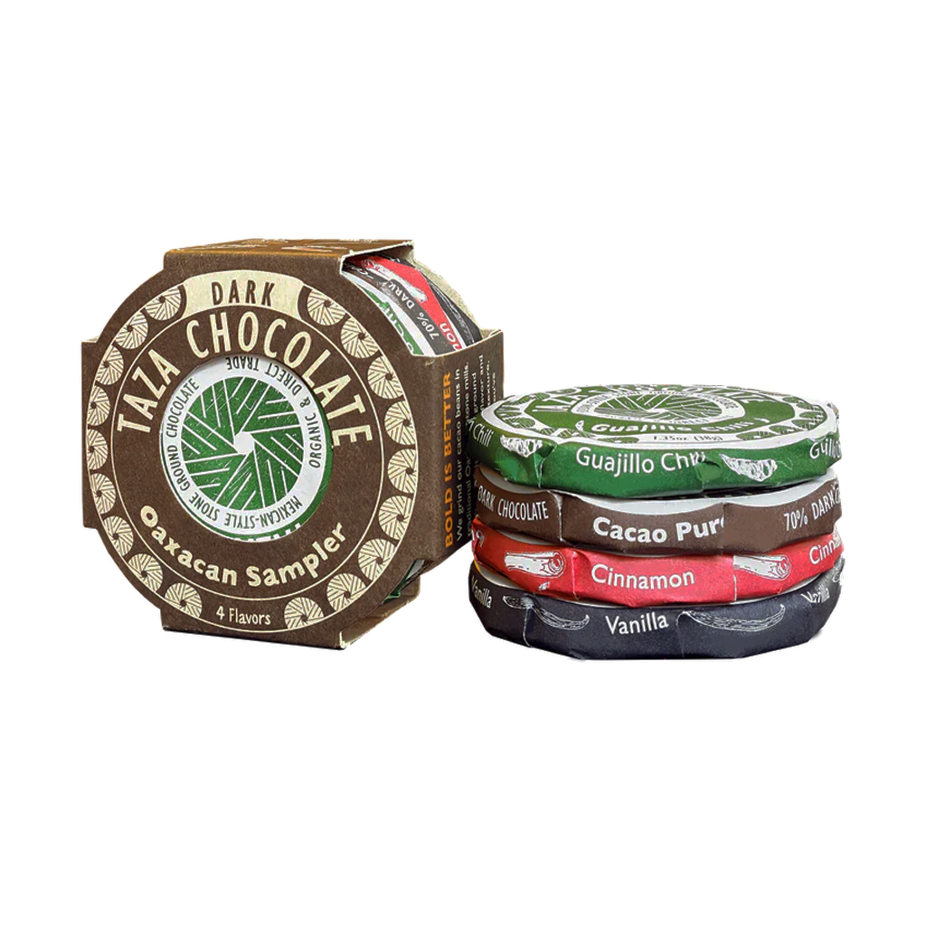 Taza Chocolate Oaxacan Sampler with various flavored chocolate disks on a white background
