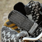 Wool mittens with pattern in bike basket.