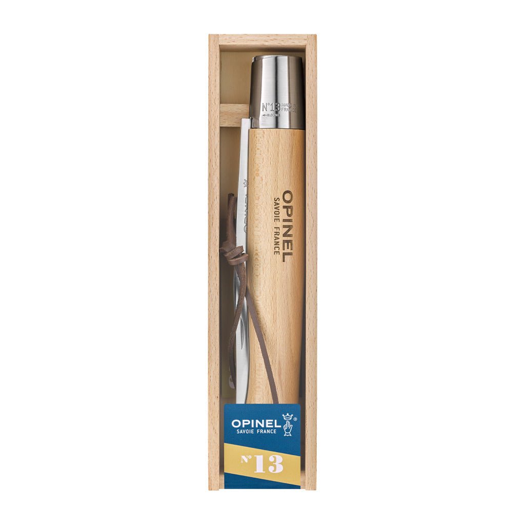 An Opinel giant knife in wooden gift box on white background.