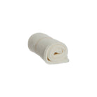 A rolled-up white knitted washcloth on white background