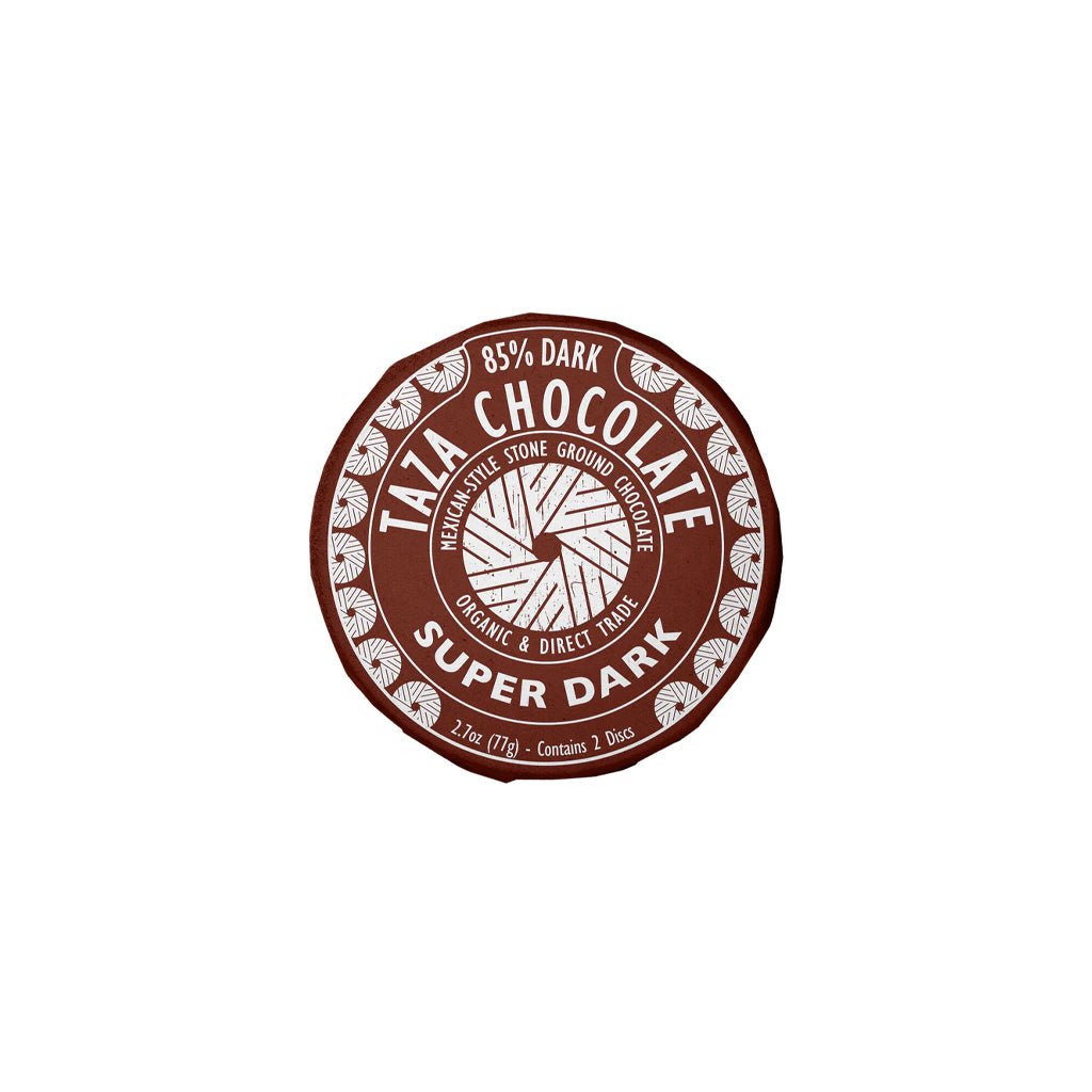 Taza Chocolate Super Dark stone ground chocolate disc in packaging on a white background