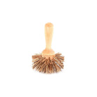 Small wooden dish pan brush with dark union fiber bristles on white background