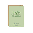 Green greeting card with plant illustrations and kraft envelope on white background